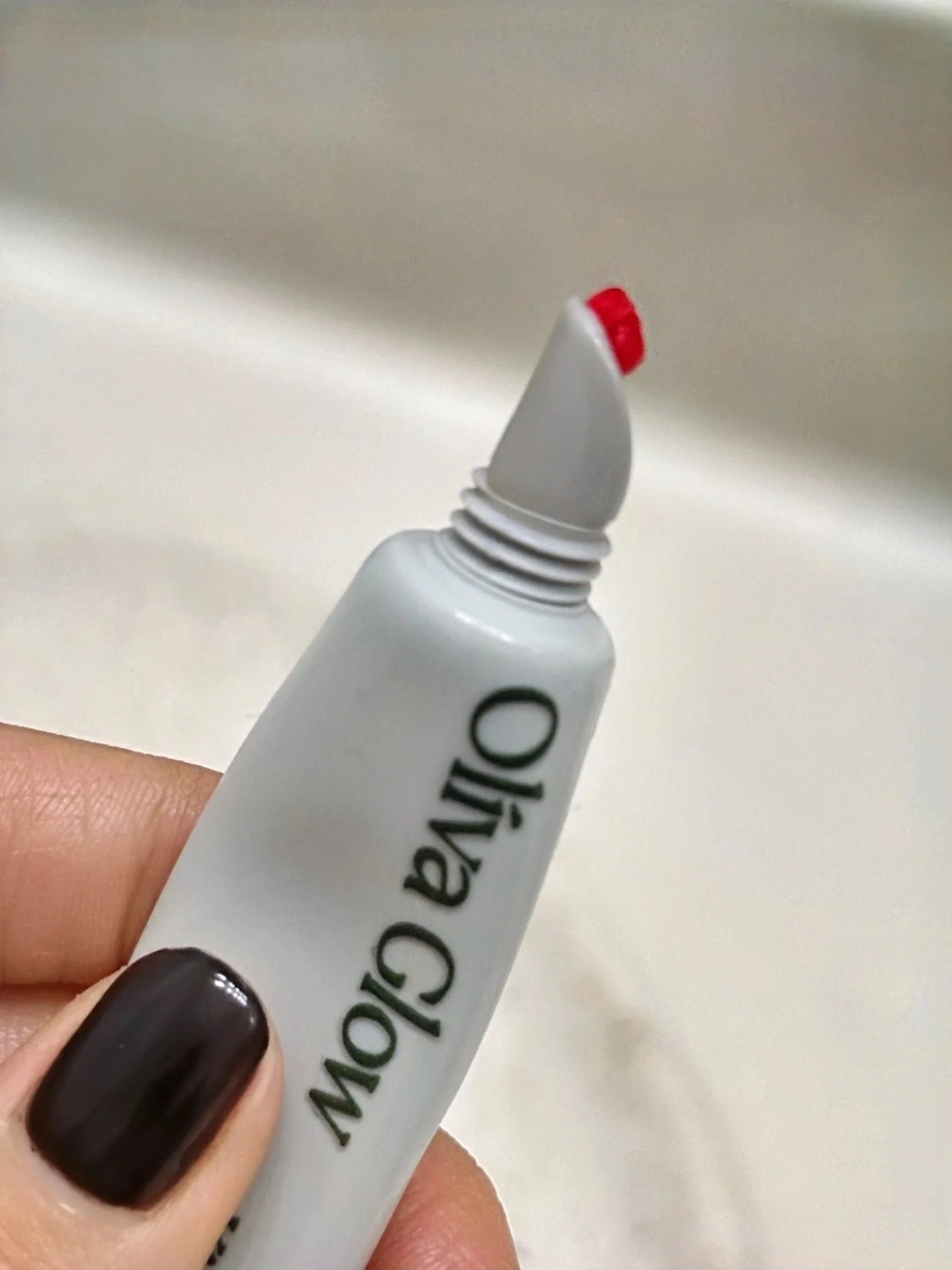 Olíva Glow Lip Butter providing deep hydration, cooling peppermint finish, and glossy nourishment.