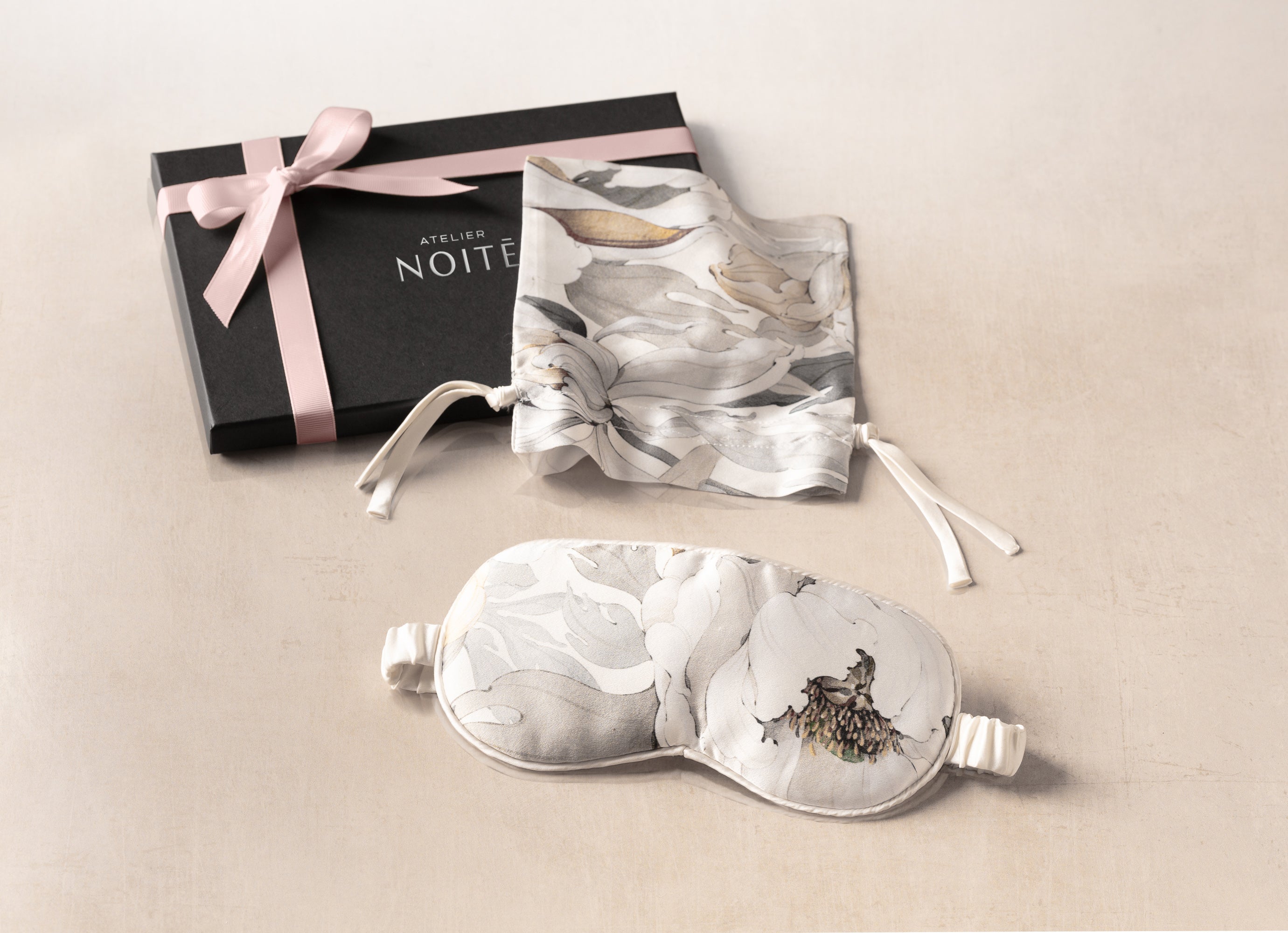 Luxury white floral Moonlight Poppy Mulberry silk eye mask with matching pouch by Atelier Noitē