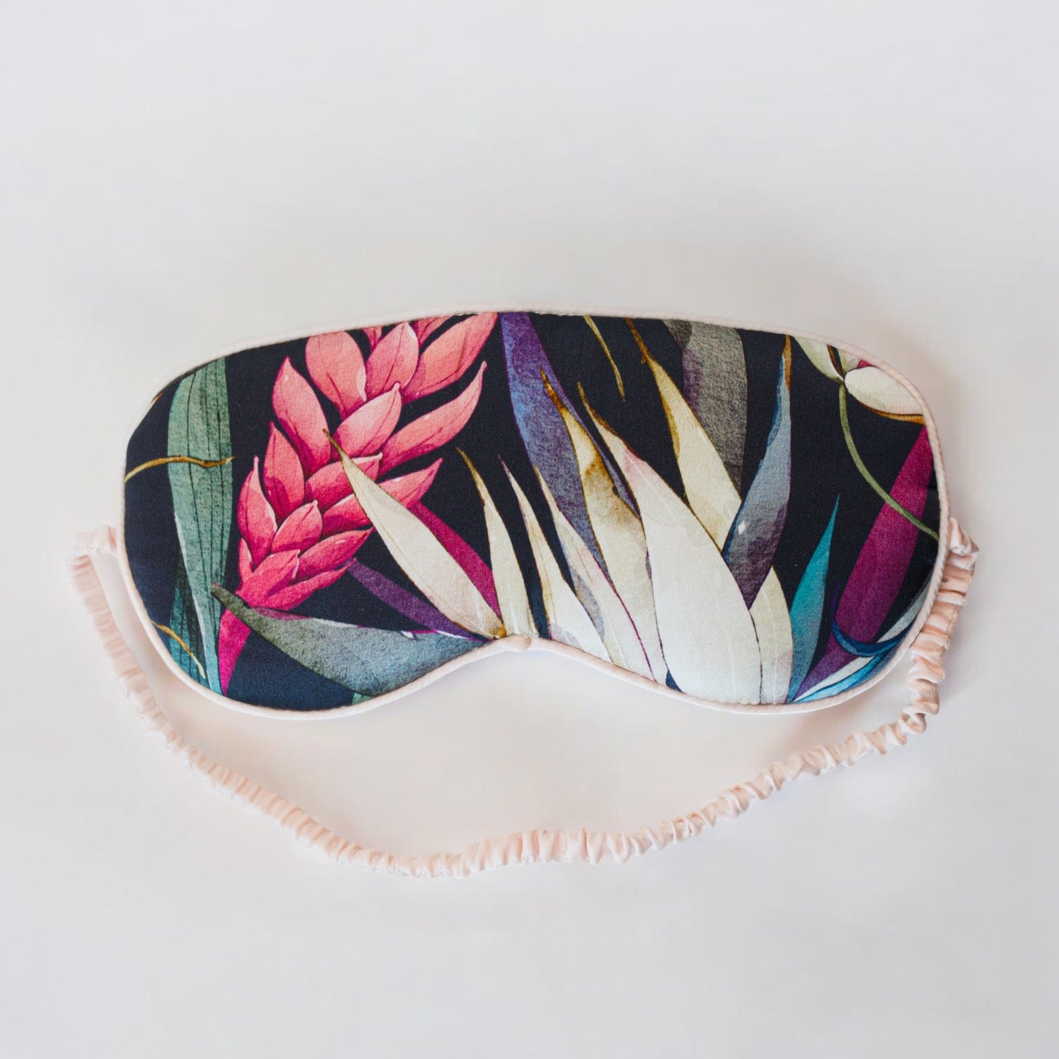 Atelier Noitē Jardim Botanico Silk Eye Mask — luxury mulberry silk sleep mask with tropical floral pattern
