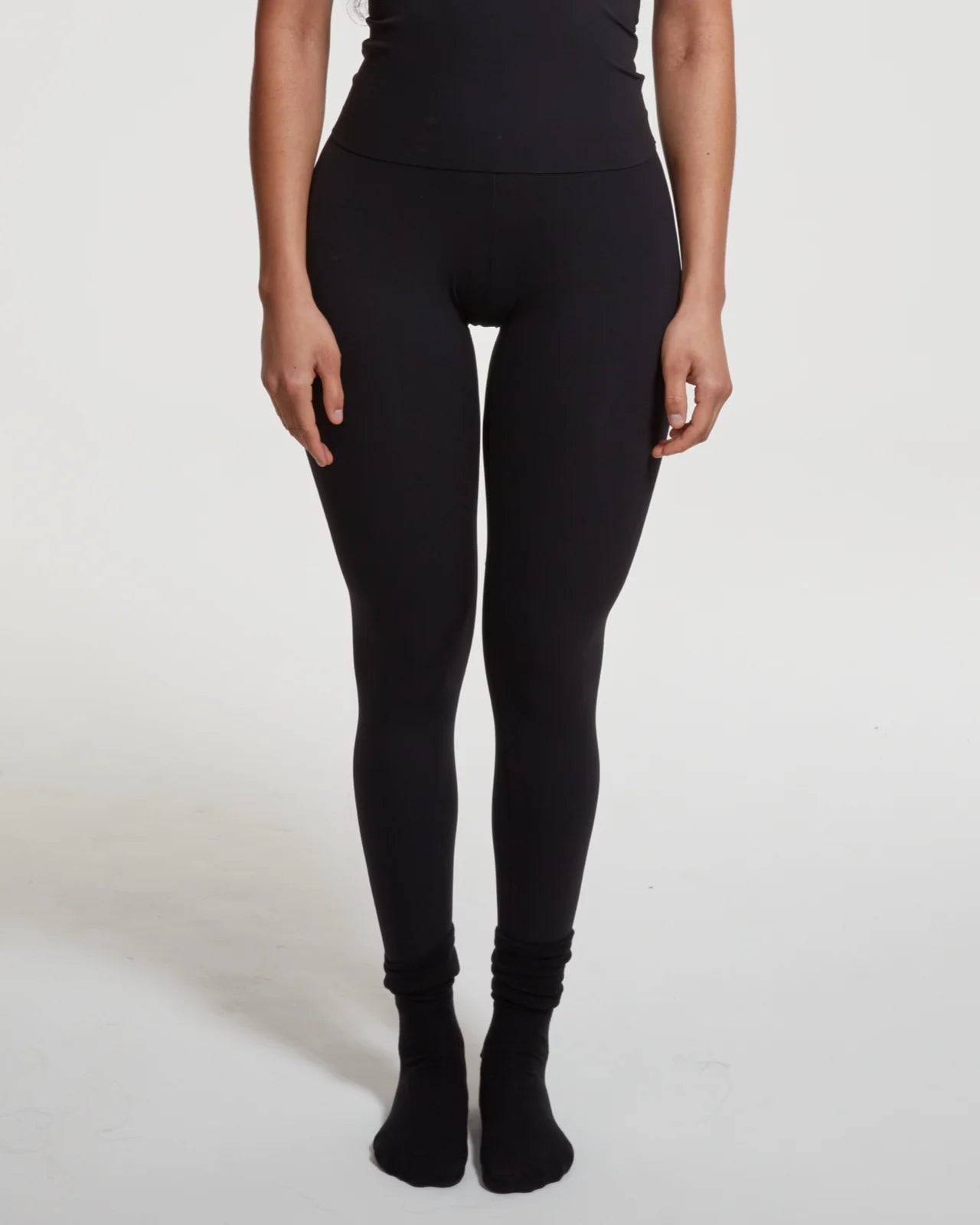 TSM Skin Tight Legging in Onyx Black – women’s fitted activewear with laser cut ankle details