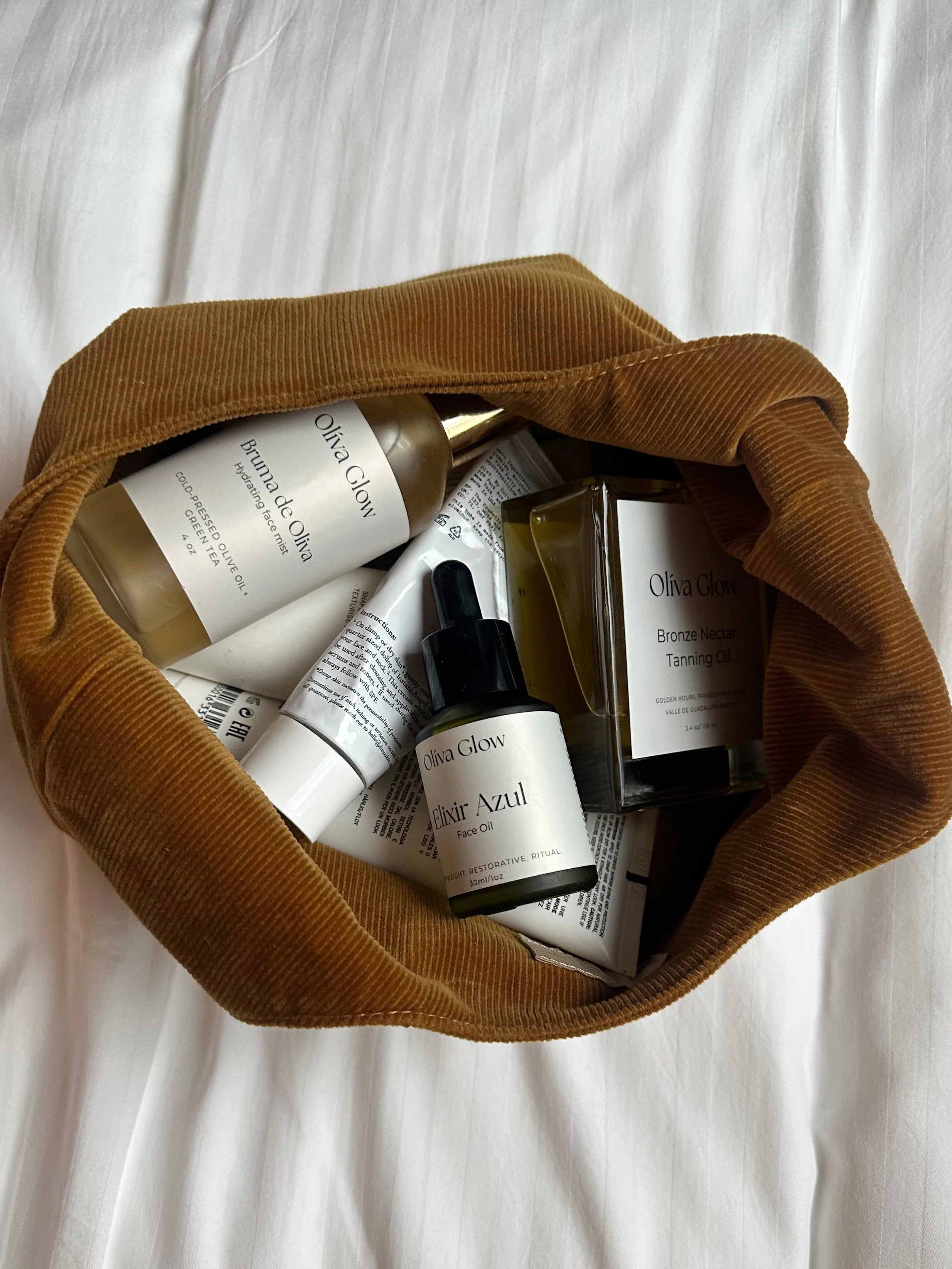 Olíva Glow Elixir Azul face oil with blue tansy and olive extract for calm, radiant, hydrated skin.