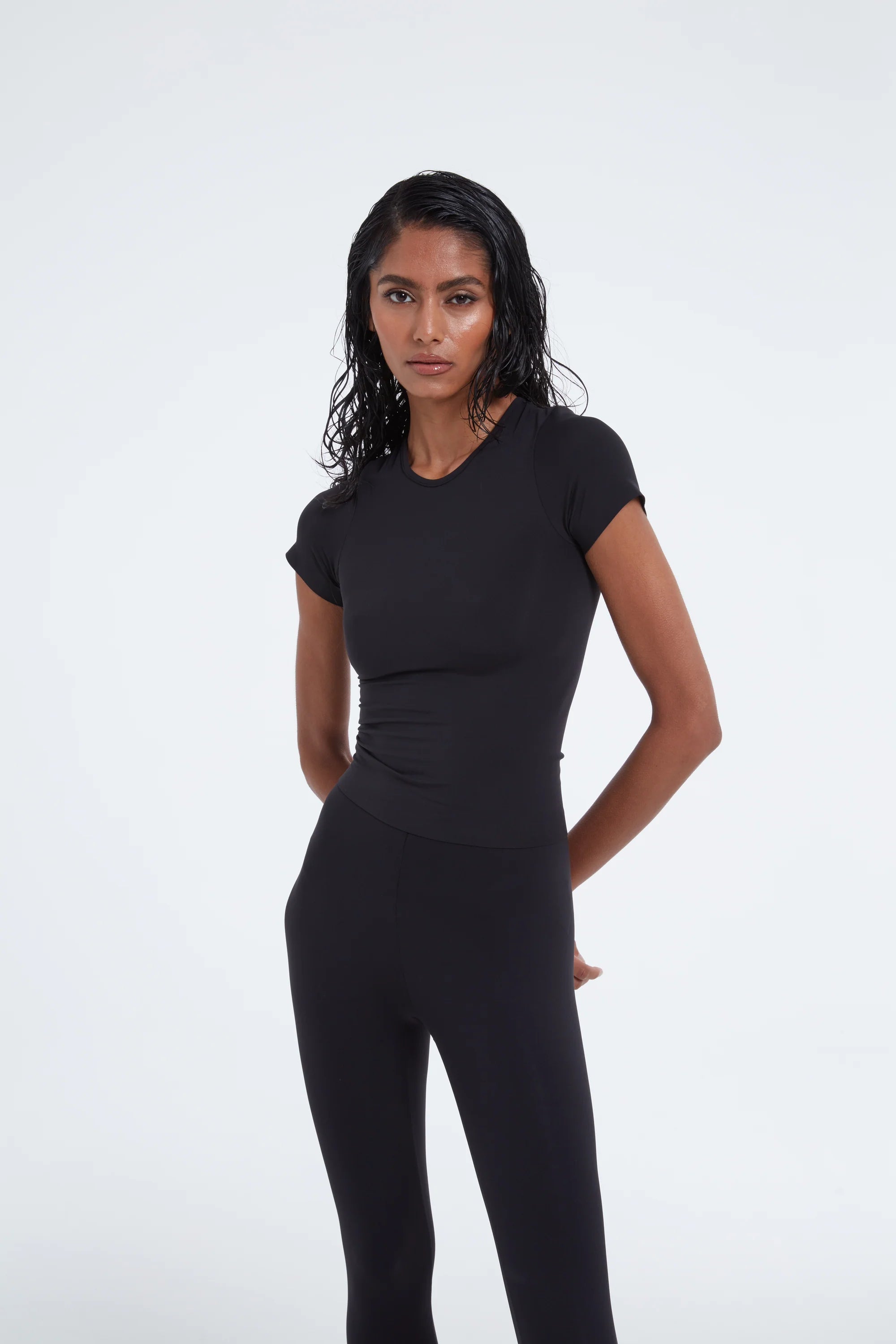 TSM Skin Tight Tee in Onyx Black – women’s fitted activewear top with soft breathable stretch fabric