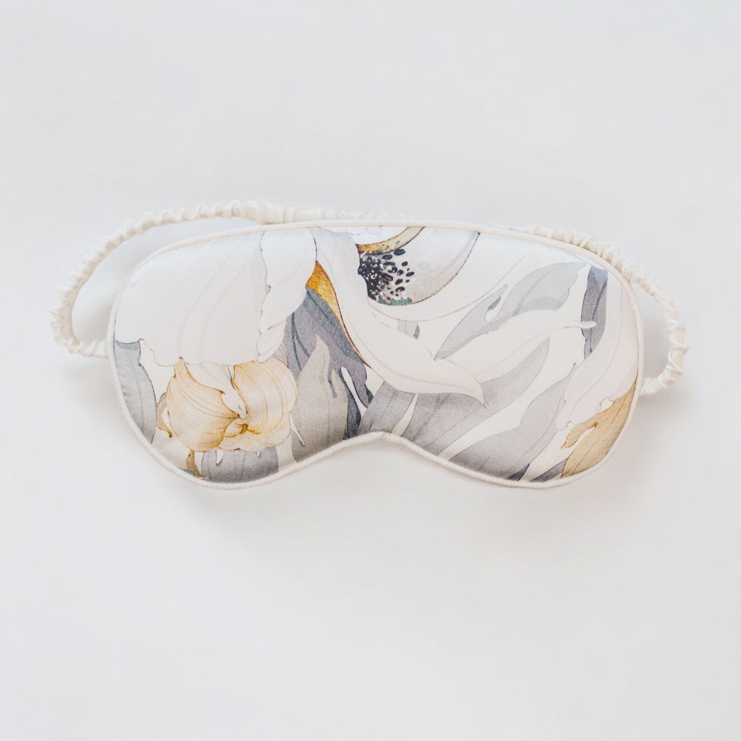 Luxury white floral Moonlight Poppy Mulberry silk eye mask with matching pouch by Atelier Noitē